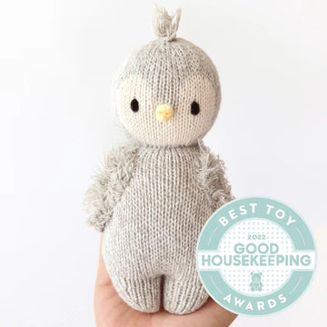 hand knit grey penguin doll by cuddle and kind