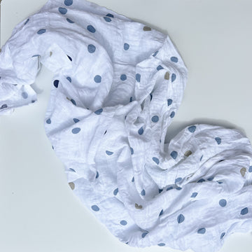 blue dots cotton muslin swaddle by aden + anais