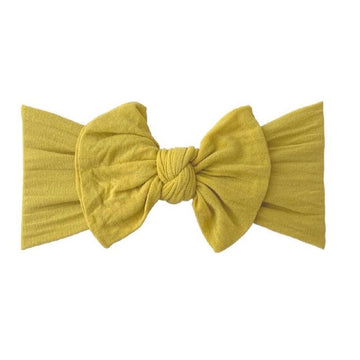 bow headband in mustard color by poppy knots