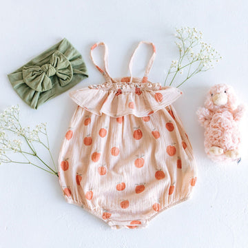 pink bubble onesie with peaches print