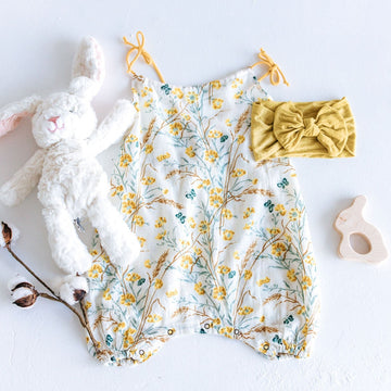 yellow floral bubble romper for baby girls